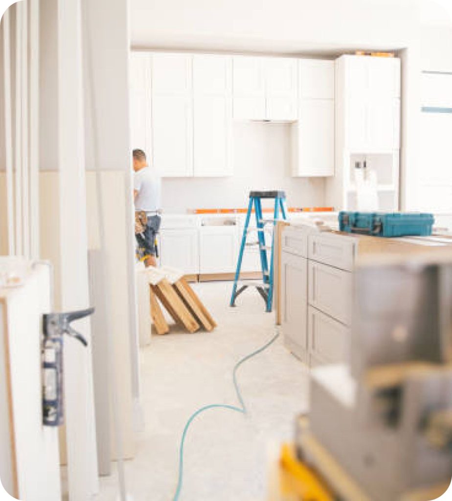 flooded worker repairing home